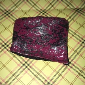 Red sludge makeup bag